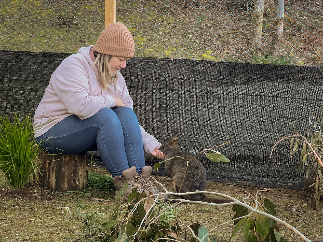 Karen caring for an orphaned joey